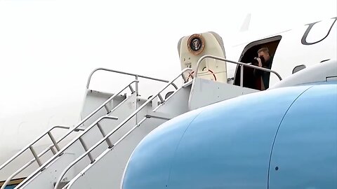 Rubio stumbles while walking up steps after Trump.