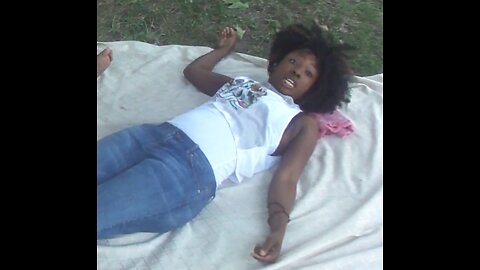 Luodong Massages Back Of Black Woman On The Picnic Blanket
