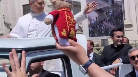 Pope Leo goes viral after effortlessly catching a plushie with one hand.