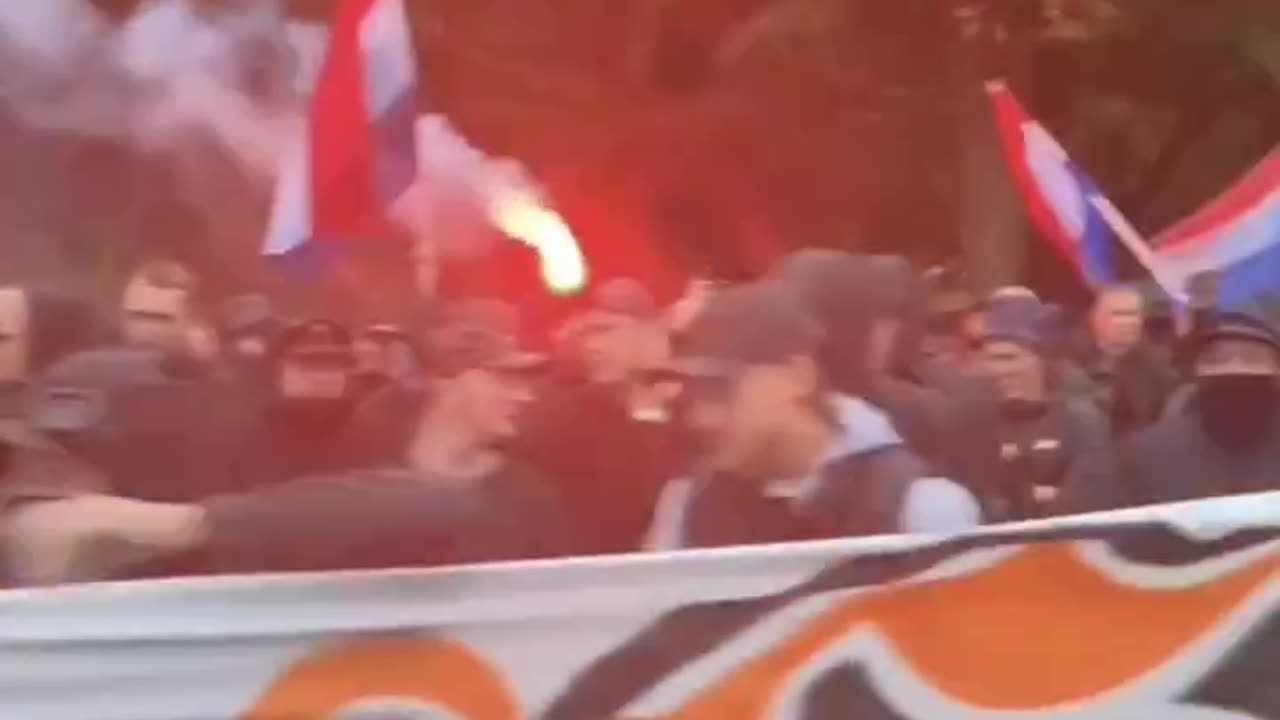 Ultras from several Dutch football teams unite to defend Netherlands from an Islamic invasion: