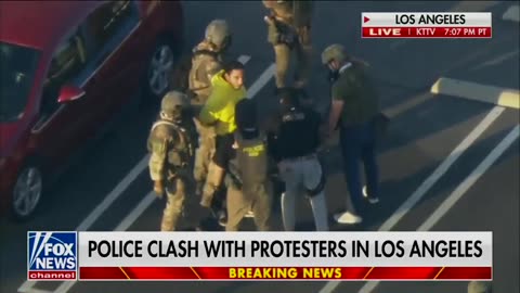 Masked Dude Threw Rocks at ICE, So ICE Threw the Masked Dude Down