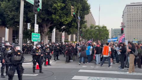Hundreds of CHP law enforcement in riot gear just showed up on scene as 8pm curfew has begun