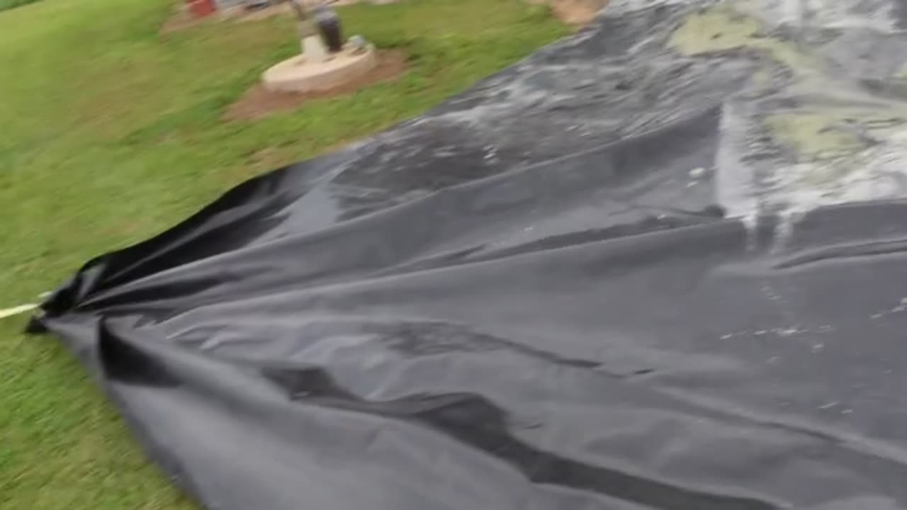 Pond Liner In Place. John Deere 2305 Does All The Work