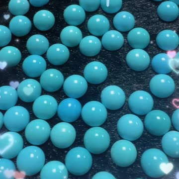 20250712-2 Sleeping Beauty Turquoise Cabochon: Galaxy Slice Locked on Fingertip