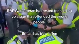 RAF veteran arrested by zogbot pigs for holding up a sign