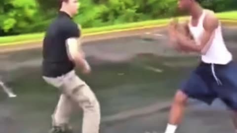 Teen Body Slams Rival Into the Curb During Brutal Street Fight