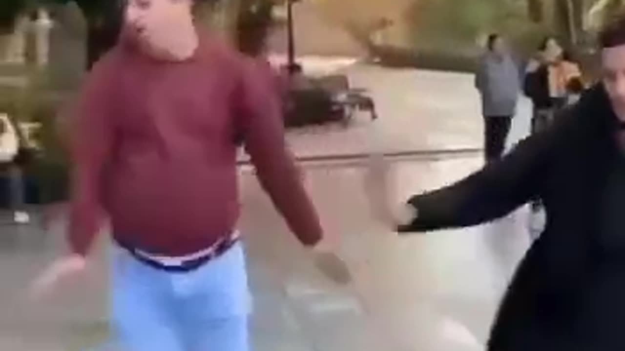 Dancing and exercising in a park in Tehran