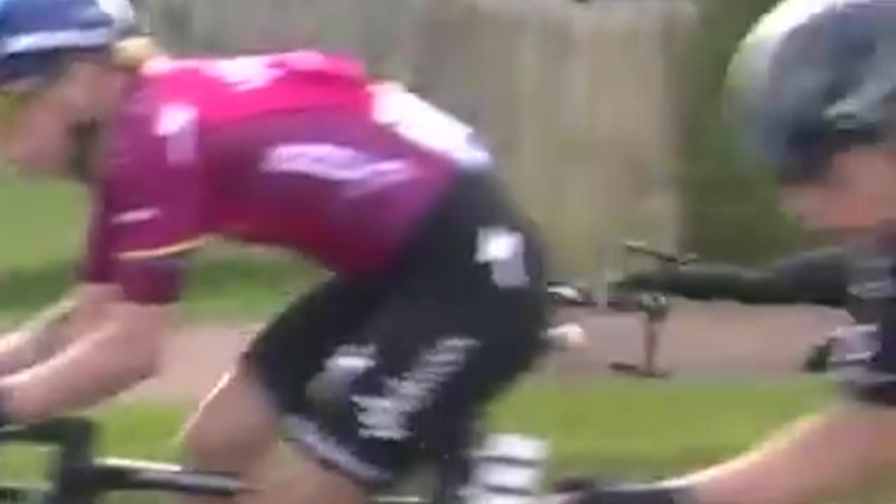 Trending: Spectator Crashes While Riding Alongside Peloton! #shorts