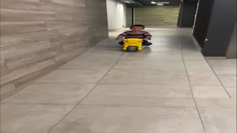 Boy Rides Motorcycle into Doorway