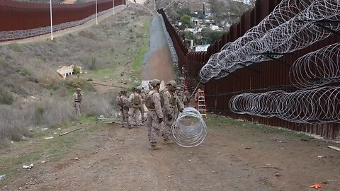 Border Patrol Reinforces Wall with Spiked Wire & Military Support