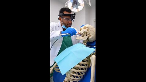 Joseph Martelli the dentist drilling Peter Armstrong teeth