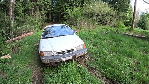 Driving the Toyota Tercel Through a Deep Creek