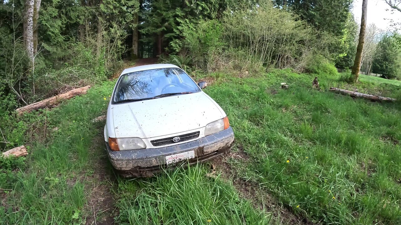 Driving the Toyota Tercel Through a Deep Creek