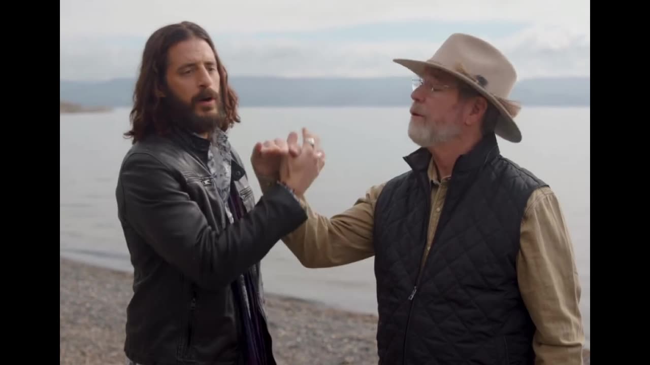 Jonathan Roumie and Jeff Cavins come together with a new greeting- hand shake- lets make it go viral