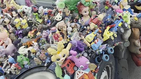 Car Covered in Toys