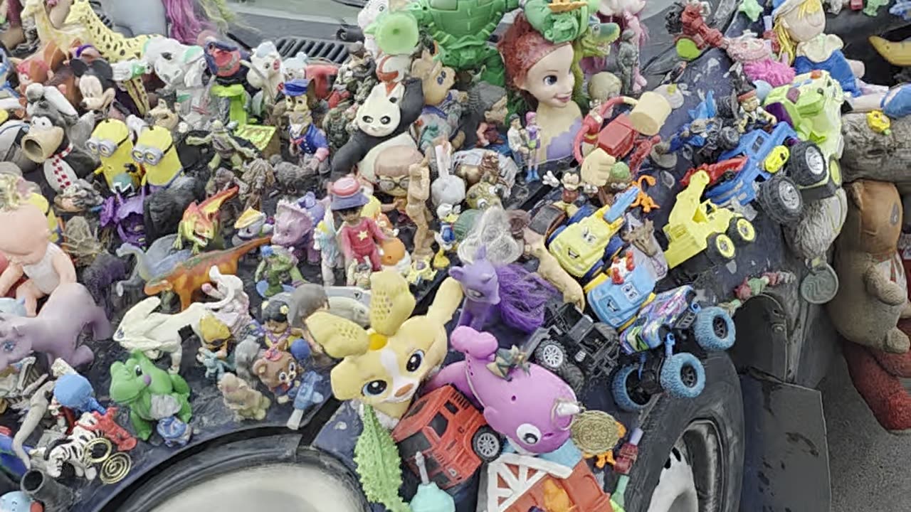 Car Covered in Toys