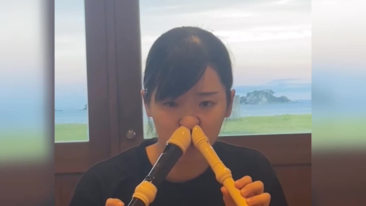 High Art - Girl playing flute with nose
