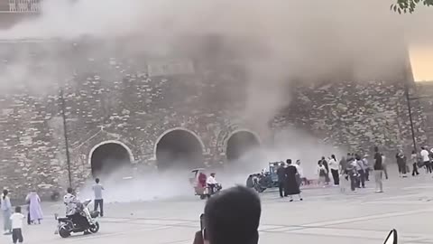 NEW: The roof of a 650-year-old drum tower in Anhui, China, collapses.