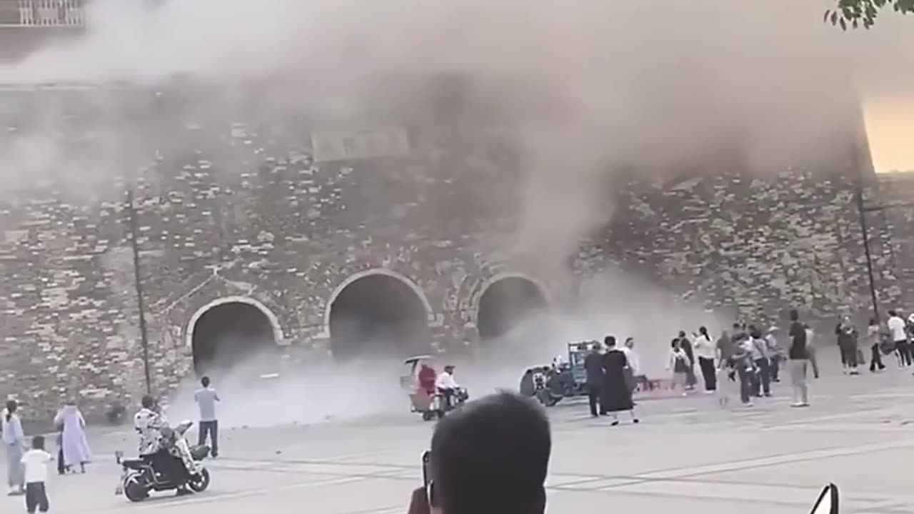 NEW: The roof of a 650-year-old drum tower in Anhui, China, collapses.