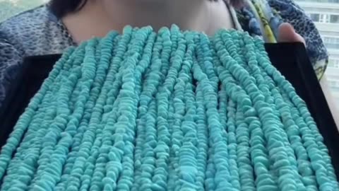 Natural turquoise beads freeze eons of turquoise flow