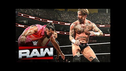 Seth Rollins attacks CM Punk & LA Knight during their match against The Vision Raw, Aug. 11, 2025