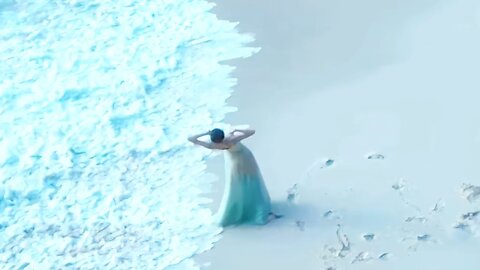 Unveiling Elegance: A Dancer's Escape into the Turquoise Embrace