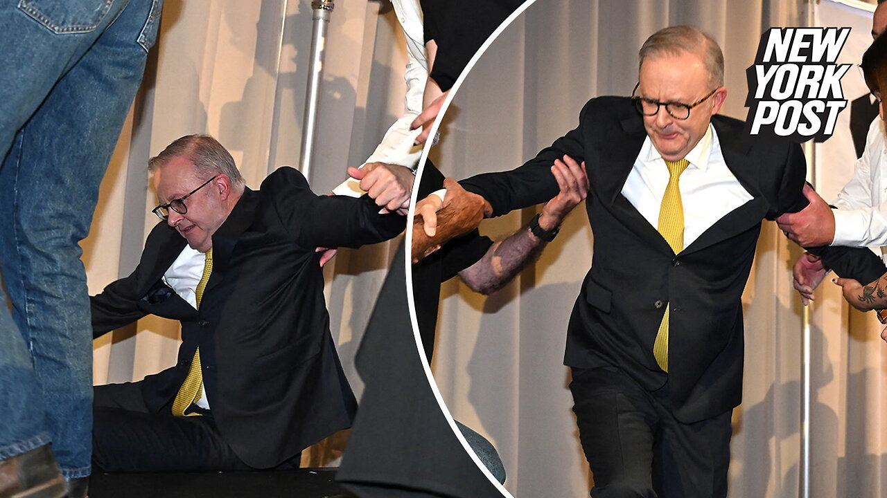 Australian prime minister tumbles off stage during campaign event