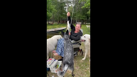 Erica catches a big catfish.