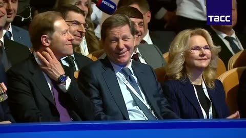Putin laughs during a conference when he is reminded that his phone call