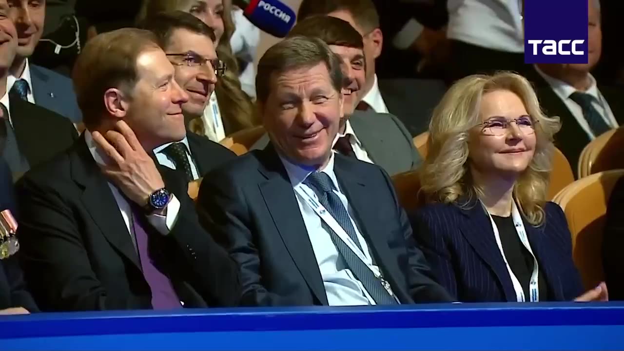 Putin laughs during a conference when he is reminded that his phone call
