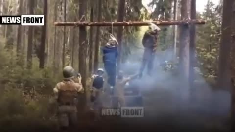 Azov Ukrainian soldiers hanging husband and pregnant wife for the crime of being Russian