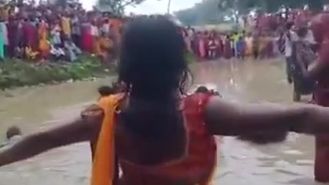 HINDUISM IS SATANIC: Indian Women Perform a Satanic Ritual in a River in India