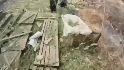 Incredible First-Person Footage of Ukrainian Soldier Throwing Shell into Bunker