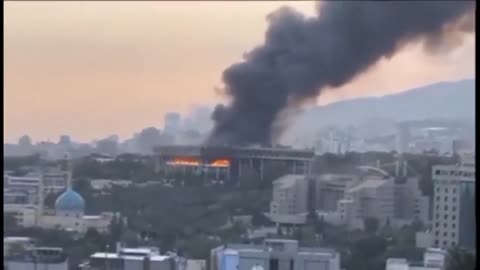 Distant View Of An Iranian State TV Building After Missile Strike