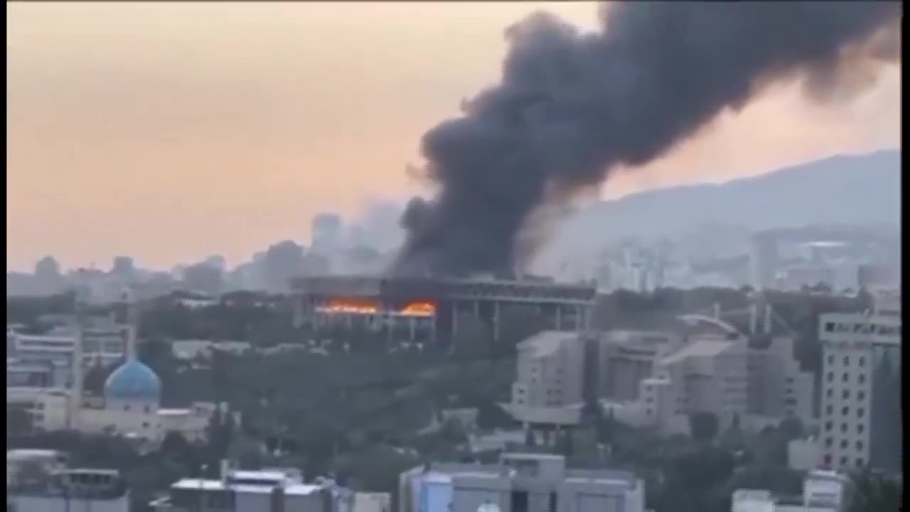 Distant View Of An Iranian State TV Building After Missile Strike