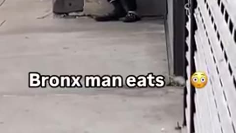 NYC Homeless Man Eating a Rat