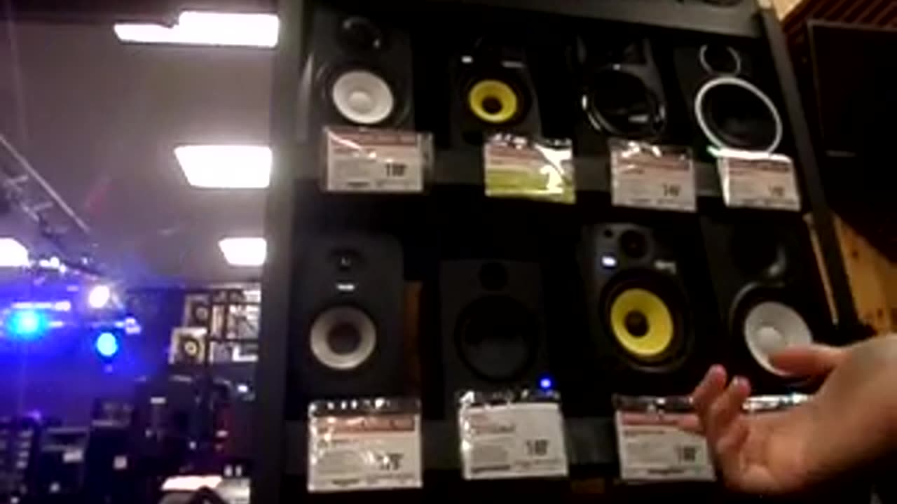 Talking about sound systems at Guitar Center