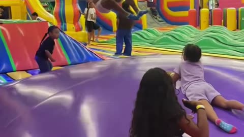 Dad Jumps and Daughter Does a Full Backflip