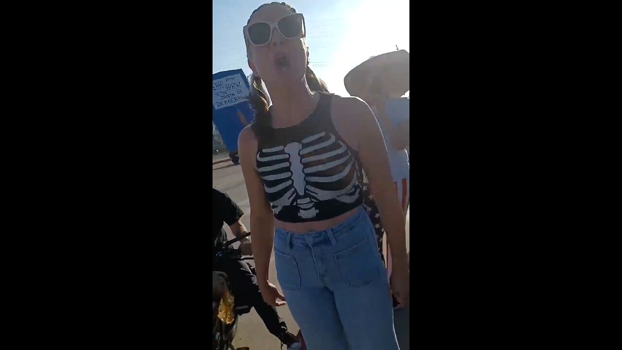 "Big MAGA Freak" attacked at protest by rabid OnlyFans creator