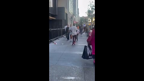 Guy smacks random kid in the street for no reason