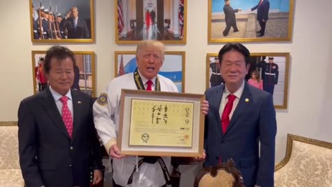 OMG! Our President is in a Karate Suit. I love it lol
