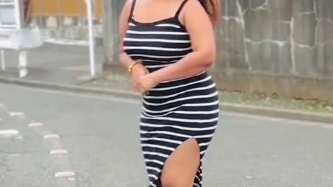 A girl with a beautiful dress and body.