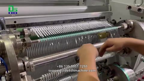 Correction tape slitter, slitting and rewinding into separate small rolls
