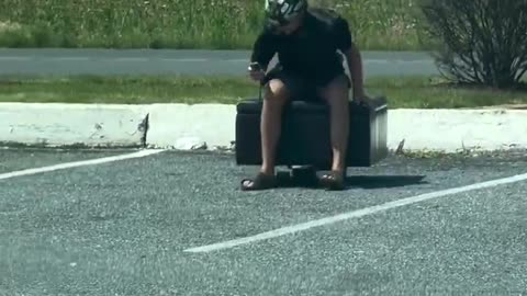 Bro driving a couch cushion...