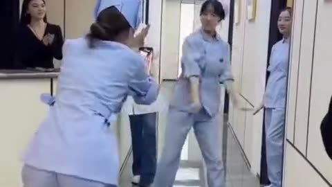 Nursing staff dance break! Friend matches moves while filming! 💃📹 #NurseLife