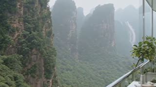 Balcony Overlooking Mountains, Relaxing Lounge, Waterfall.