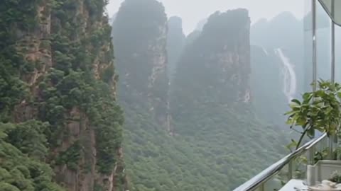 Balcony Overlooking Mountains, Relaxing Lounge, Waterfall.