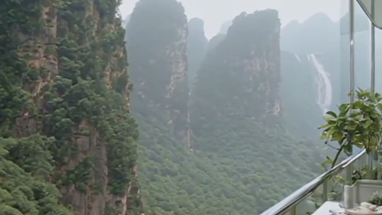 Balcony Overlooking Mountains, Relaxing Lounge, Waterfall.