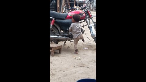 funny short Attempt to climb the baby bike