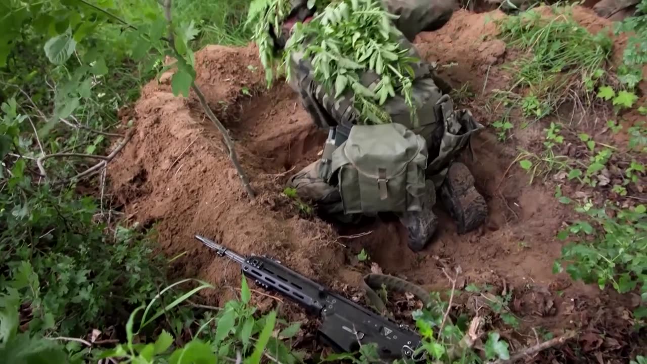 'Anything to keep my child safe': Polish mother trains for war
